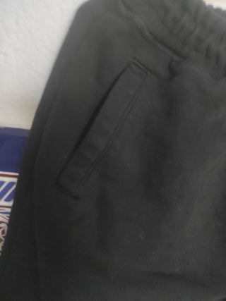Pantalón chándal negro con logo