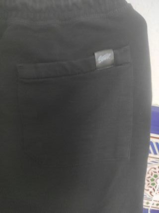 Pantalón chándal negro con logo