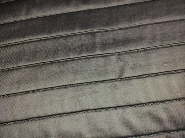 Colcha 135 cm morado y caqui y dos fundas cojin