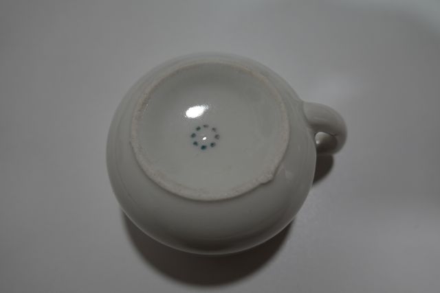 Taza y plato de porcelana vintage