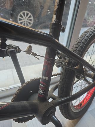 Bicicleta BMX negra Rockrider  Coluer Rotor 360