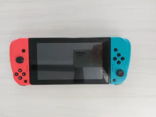 Nintendo Switch Azul y Rojo y mandos