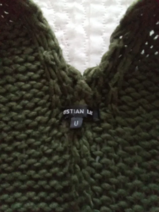 Poncho de punto en verde y morado