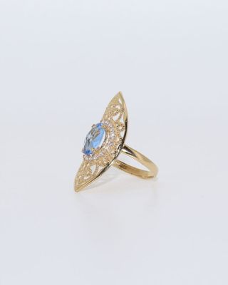 LANZADERA PEQUEÑA PIEDRA AZUL Y CIRCONITAS 18K