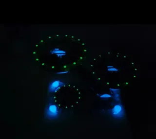 Portacandele in resina nera e dorata