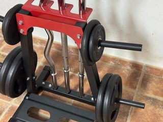 Soporte para barras y discos de gimnasio
