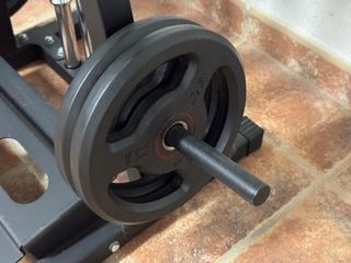 Soporte para barras y discos de gimnasio