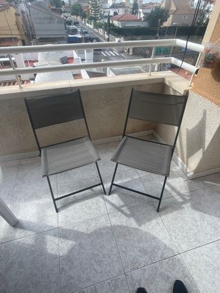 Sedie pieghevoli in metallo e tessuto