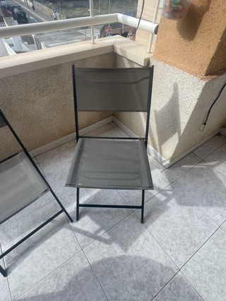 Sedie pieghevoli in metallo e tessuto