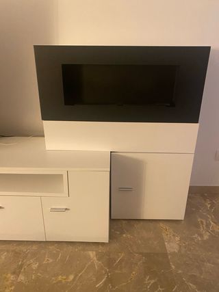 Mueble TV blanco con chimenea biogás