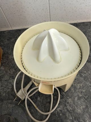 Exprimidor automatico