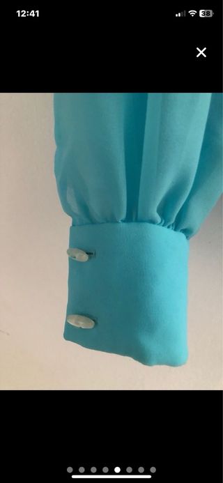 Blusa vintage azul con volantes