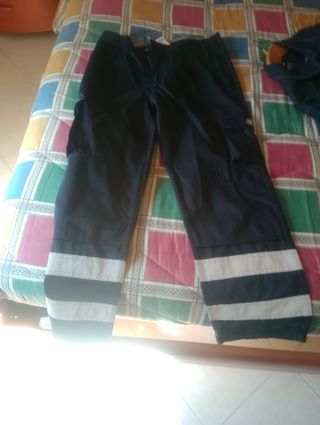 Completo da lavoro blu con bande riflettenti