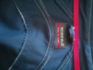 Completo da lavoro blu con bande riflettenti