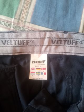 Completo da lavoro blu con bande riflettenti