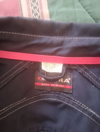 Completo da lavoro blu con bande riflettenti