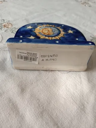 Portatovaglioli in ceramica sole e luna