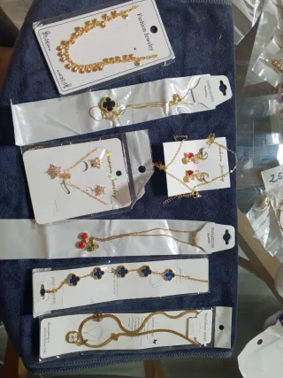 Lote Joyas Chino Acero Dorado