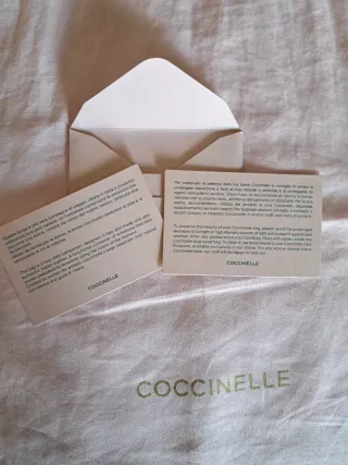 Borsa Coccinelle bianca in pelle