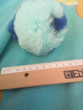 Peluche conejito raro azul y menta