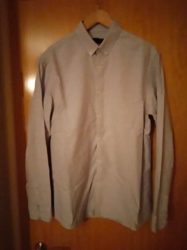 Camisa gris manga larga
