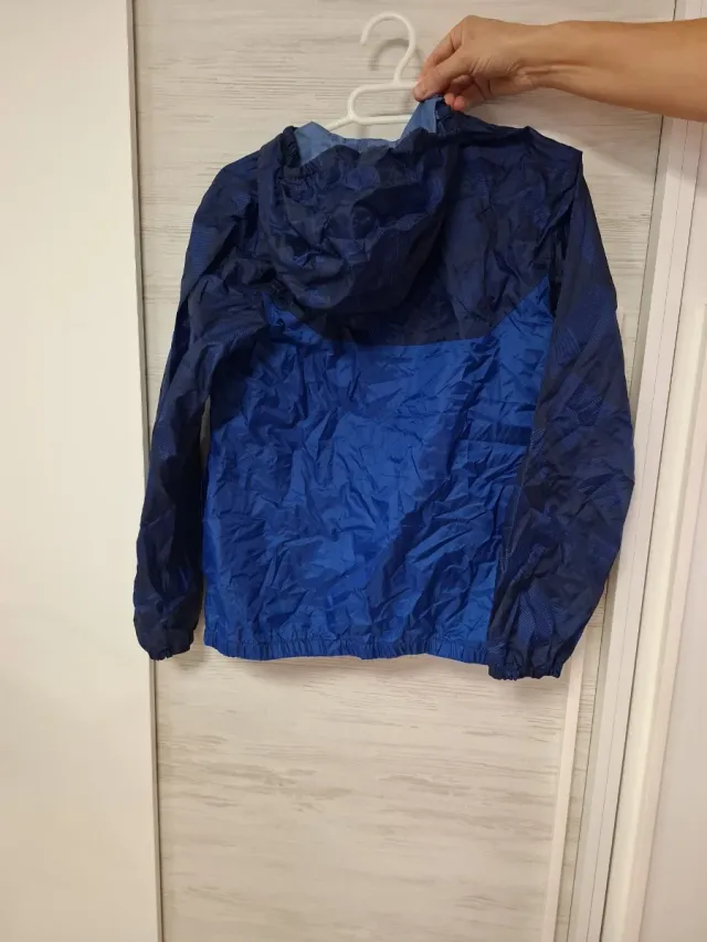 Chubasquero plegable Quechua MH150 azul.. 10-11 a.