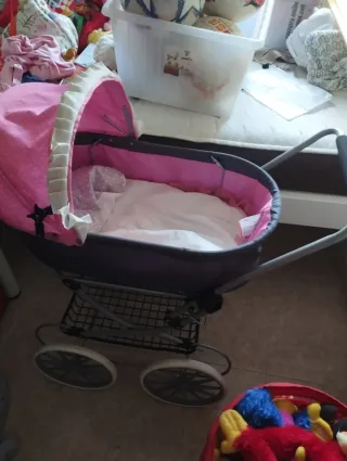 Carrito de juguete para bebé rosa