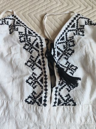 Mono blanco bordado Benetton