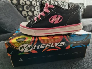 Zapatillas Heelys con ruedas negras y rosas