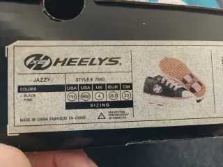 Zapatillas Heelys con ruedas negras y rosas