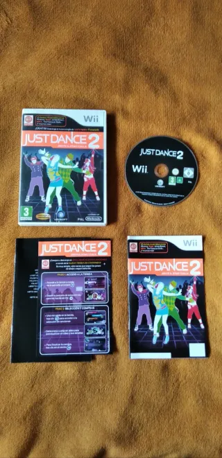 Juego Wii original
Just Dance 2.                  