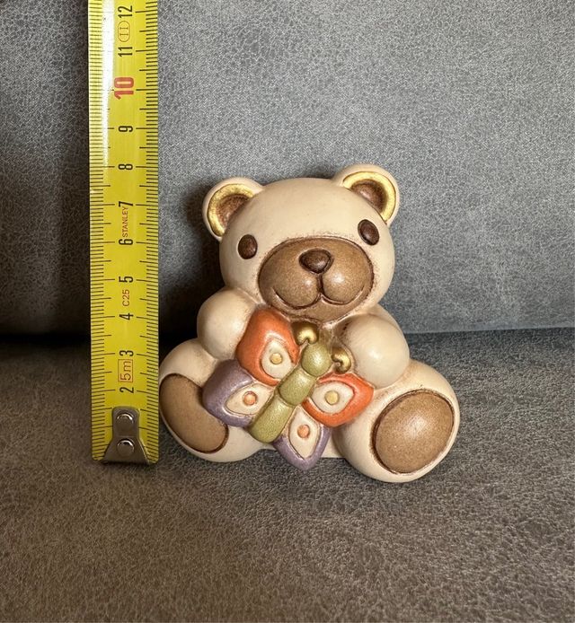 Orsetto Thun con farfalla