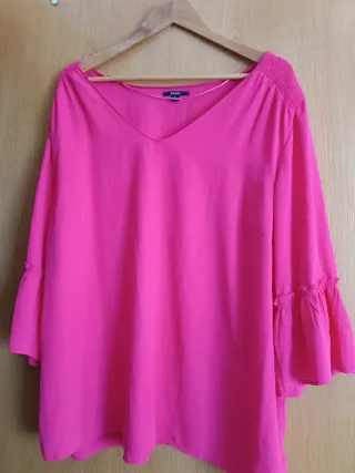 Blusa Kiabi rosa talla única con volantes