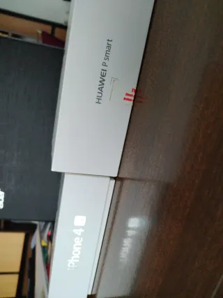 iPhone 4s e Huawei - Argento e bianco