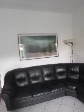 Divano angolare in vera pelle nero