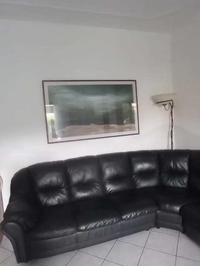 Divano angolare in vera pelle nero