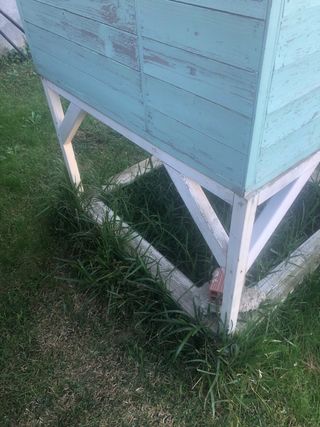 Casa de madera para niñas con tobogán