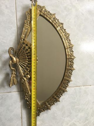 Abanico de bronce decorativo