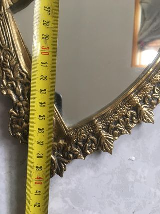 Abanico de bronce decorativo