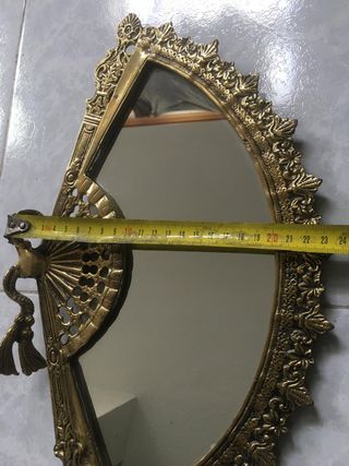 Abanico de bronce decorativo
