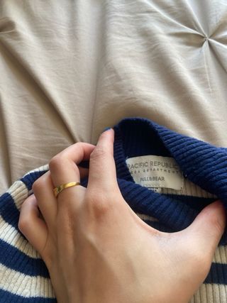 Jersey de rayas azul y blanco