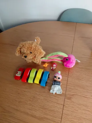 Set di giocattoli: passeggini, bambole e peluche