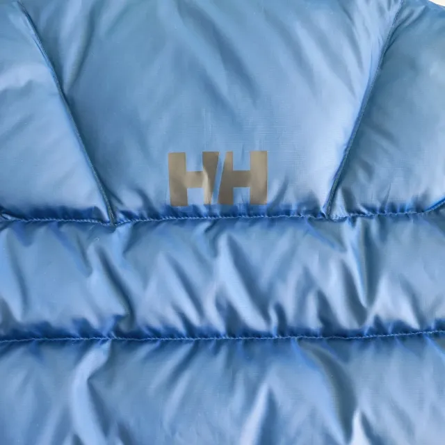 Chaleco plumífero niño Helly Hansen azul.