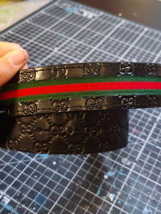 Cintura Gucci GG logo nera con strisce