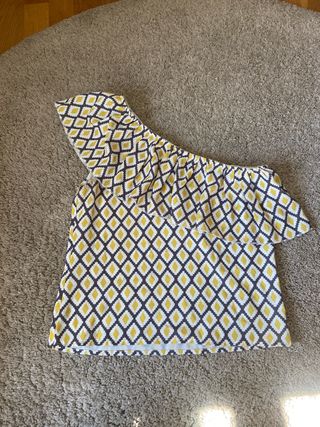 Blusa asimétrica con estampado geométrico