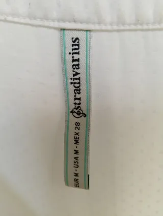 Blusa Stradivarius sin mangas blanca