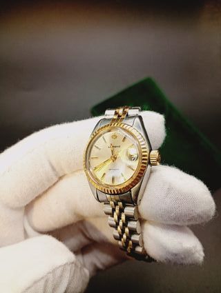 Reloj Lorenz Datejust y funda Rolex