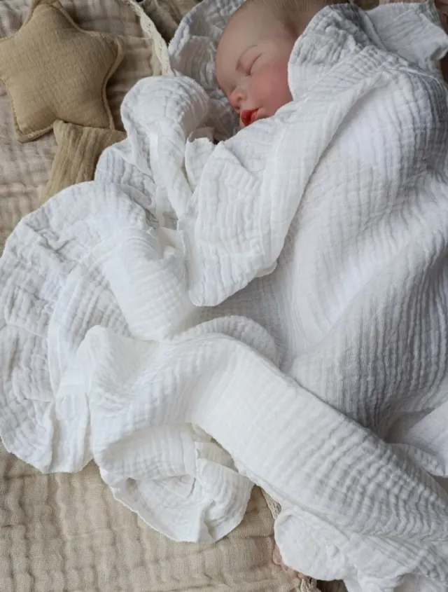 Manta muselina blanca con volantes