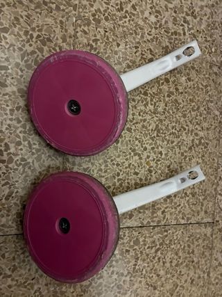 Bicicleta infantil rosa con asiento trasero