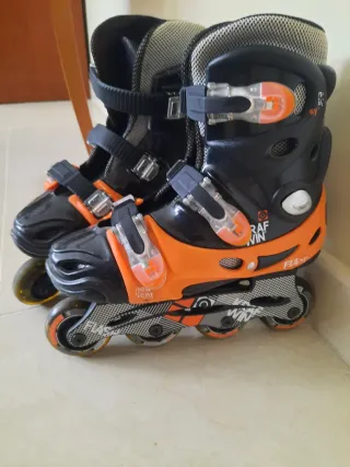 Patines en línea naranja y negro  Talla 36.